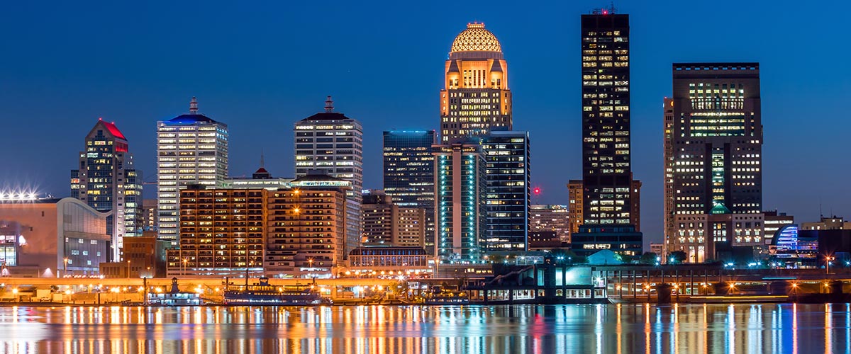 Photo of the Louisville city skyline at night