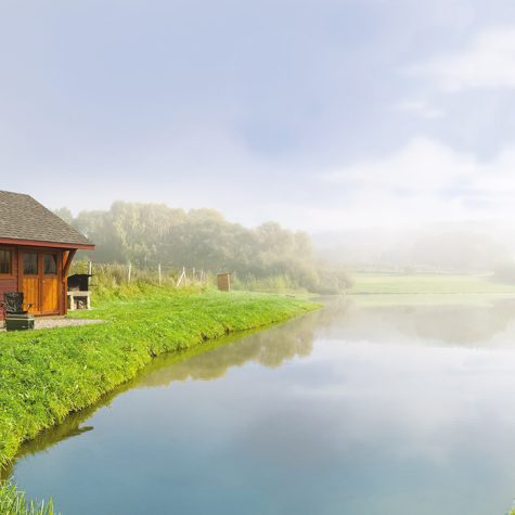 Fishing lodge above the pond
